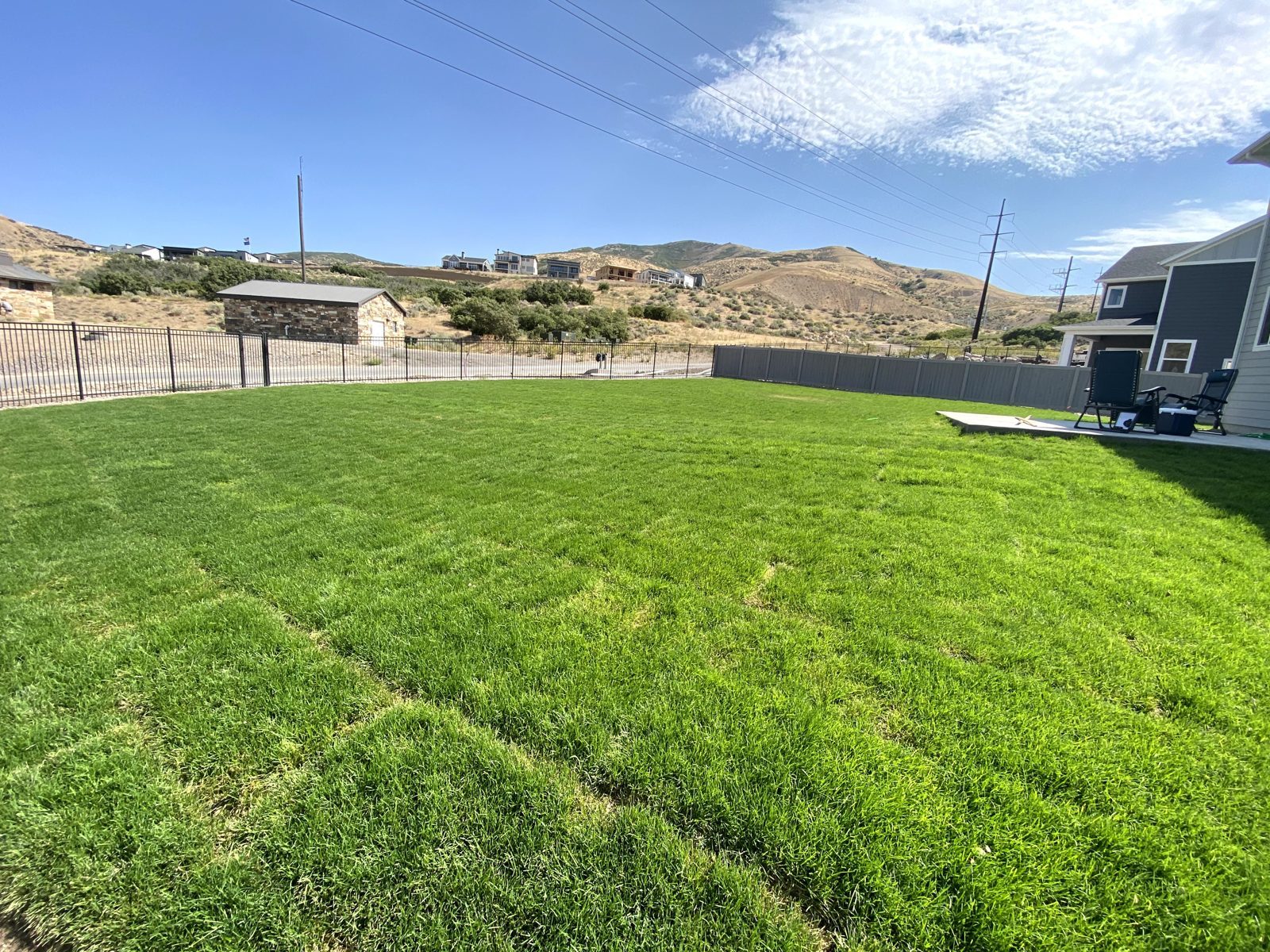 Large new backyard lawn with a mountain view in Utah County