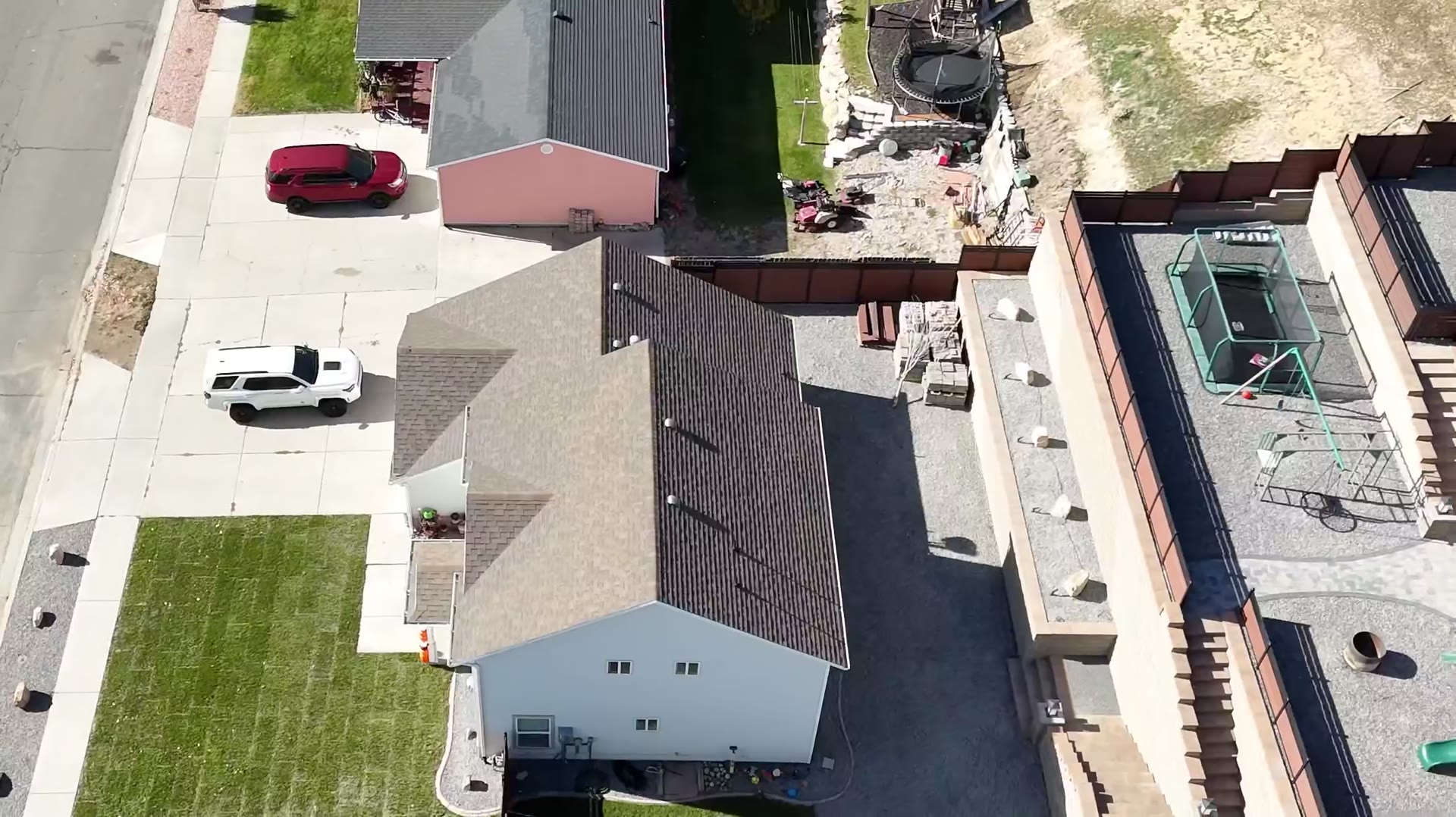 Drone view of terraced block retaining walls, block steps and fire pit