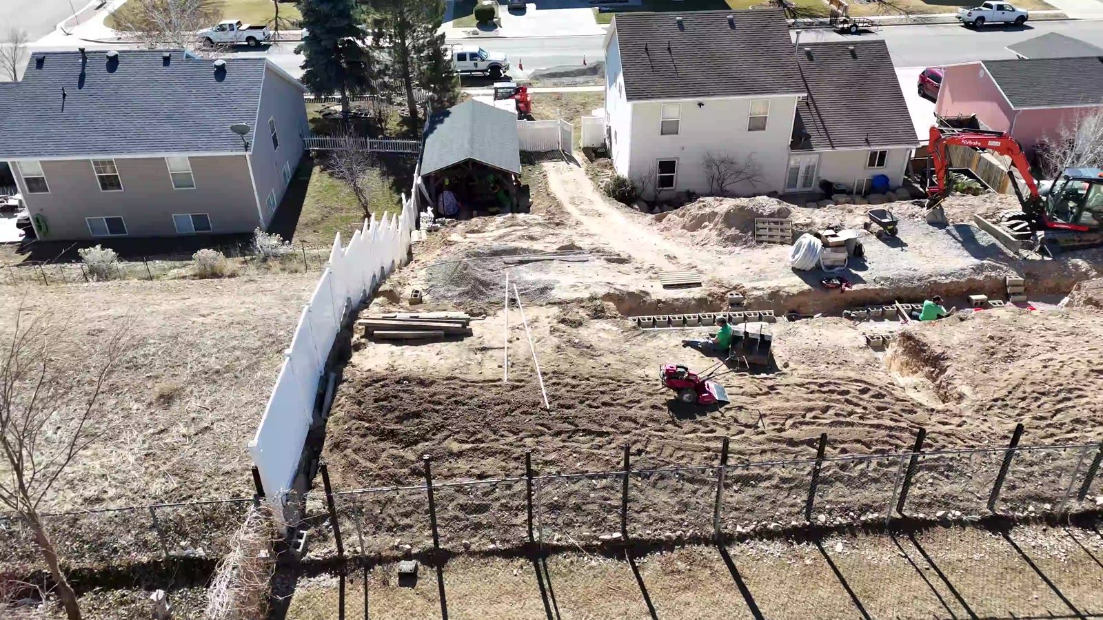 Drone view of the backyard during excavation and grading